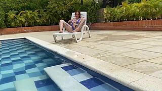 Naughty redhead tastes big cock in pool