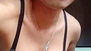 Asian ladyboy enjoys solo time in her office