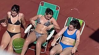 Argentinian neighbors sunbathe on terrace
