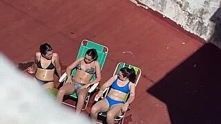 Argentinian neighbors sunbathe on terrace