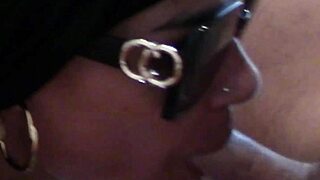 Milf with sunglasses sucks cock and swallows cum
