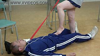 sayaka gives handjob and footjob to licking slave