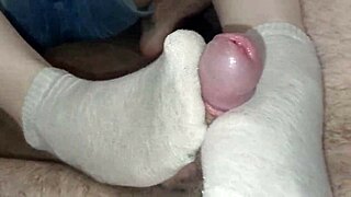 Socksjob leaves sock full of cum