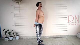 Detained lady undresses on camera