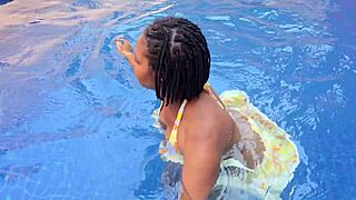 Fingering herself in the pool