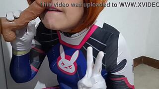 trans girl with dva cosplay and bdsm nosehook giving a blowjob eating cum and deepthroat to big dildo