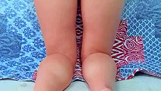 brunette rubs coconut oil over her skin