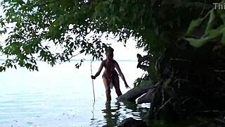 fishing with harpoon in topless